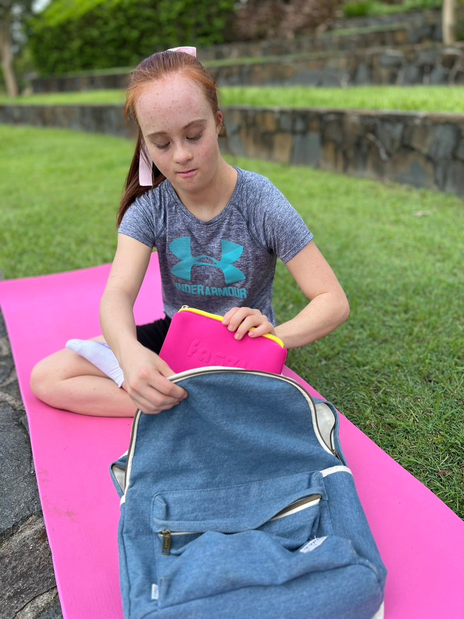 Tween girl packing her Fanzy Pantz period kit