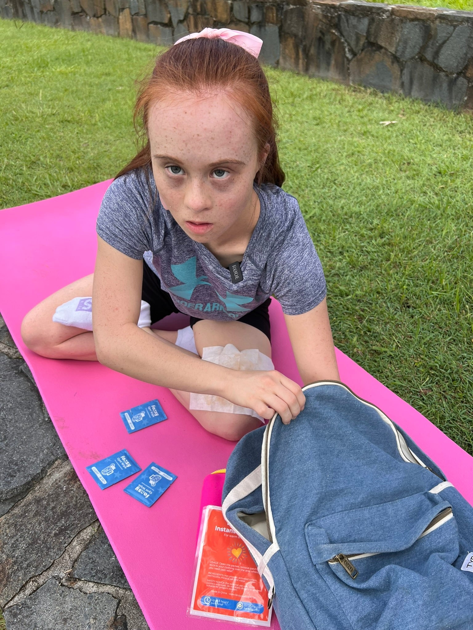 Tween girl with her Fanzy Pantz period kit and backpack